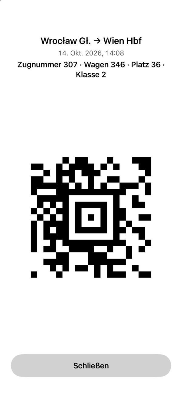 Anonymisierter Demo-Code eines Tickets Wrocław Główny–Wien Hbf auf weißem Bildschirm.